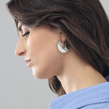 Orecchini tondi Dinamica Unoaerre da donna