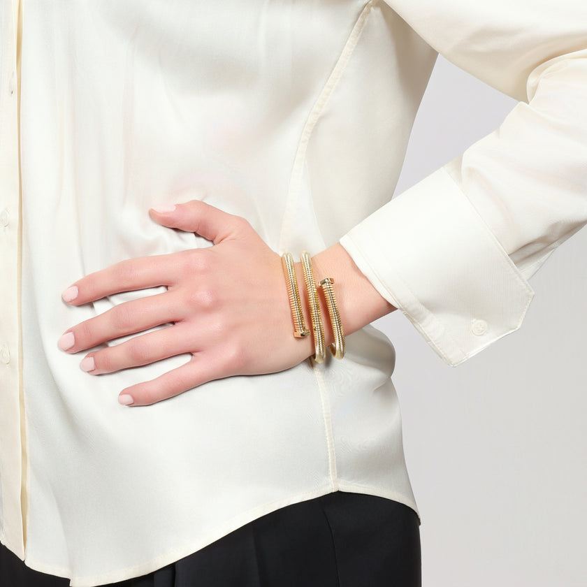Women's bracelet Unoaerre Tubogas three-strand gold-plated