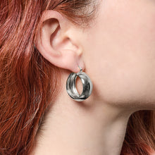 Orecchini a cerchio argentati Unoaerre da donna